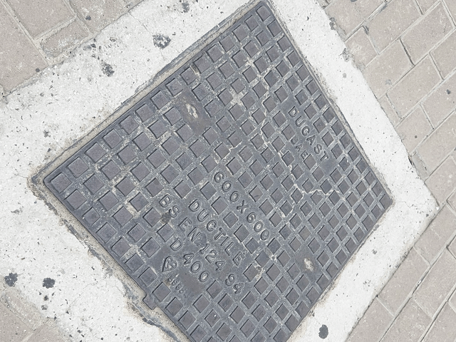 manhole cover at pedestrian zone