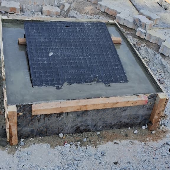 Manhole cover installation at Jebel Ali Port area